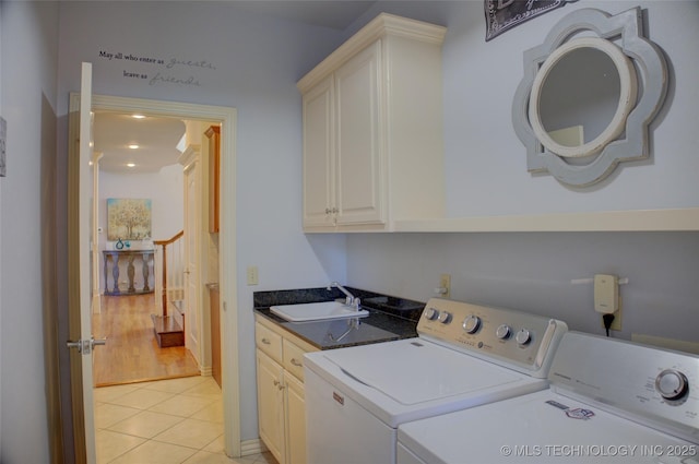 8160 S 270th E Ave, Broken Arrow, OK 74014 - laundry room with washer and dryer, cabinet space, and light tile patterned floors