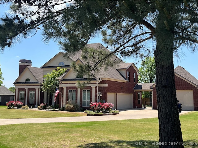 8160 S 270th E Ave, Broken Arrow, OK 74014 - view of front of home with an attached garage, brick siding, a front lawn, and driveway