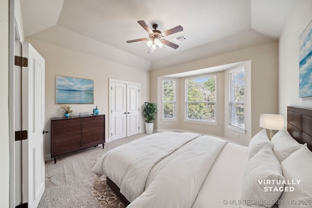 19434 S Quail Run Ct, Claremore, OK 74017 - carpeted bedroom with ceiling fan and a raised ceiling