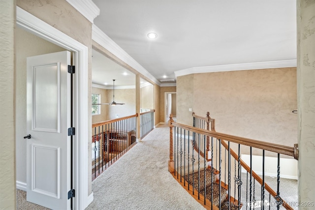 19434 S Quail Run Ct, Claremore, OK 74017 - hallway with crown molding, carpet flooring, an upstairs landing, baseboards, and recessed lighting