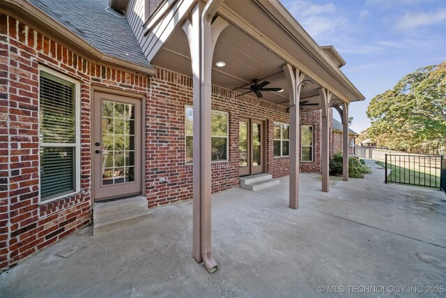 19434 S Quail Run Ct, Claremore, OK 74017 - view of patio / terrace with a ceiling fan, entry steps, and fence