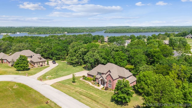 19434 S Quail Run Ct, Claremore, OK 74017 - view from above of property featuring a nearby body of water and a heavily wooded area