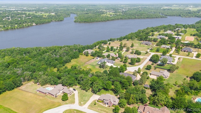 19434 S Quail Run Ct, Claremore, OK 74017 - aerial overview of property's location with a nearby body of water, nearby suburban area, and a heavily wooded area