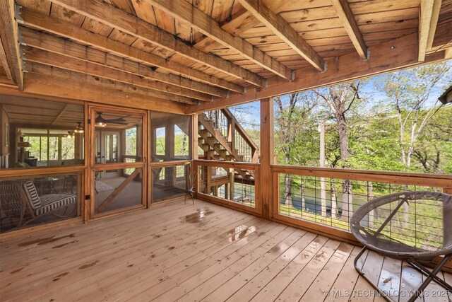 5068 County Road 370, Eucha, OK 74342 - unfurnished sunroom featuring beamed ceiling and ceiling fan