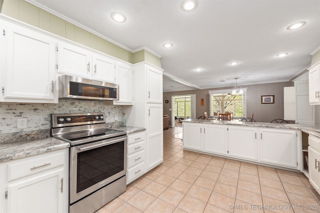 5068 County Road 370, Eucha, OK 74342 - kitchen with crown molding, recessed lighting, light tile patterned flooring, and appliances with stainless steel finishes