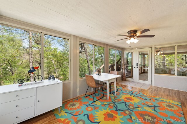 5068 County Road 370, Eucha, OK 74342 - sunroom / solarium with ceiling fan, wood finished floors, and french doors