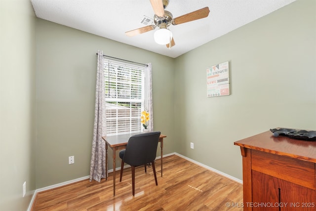 5068 County Road 370, Eucha, OK 74342 - office space featuring visible vents, ceiling fan, light wood-style flooring, and baseboards