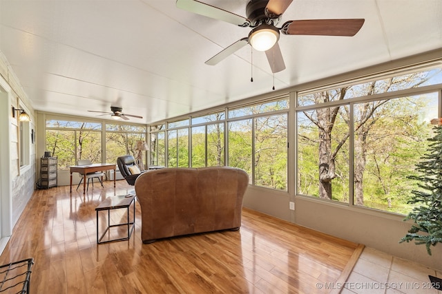 5068 County Road 370, Eucha, OK 74342 - sunroom / solarium featuring wood finished floors and a ceiling fan