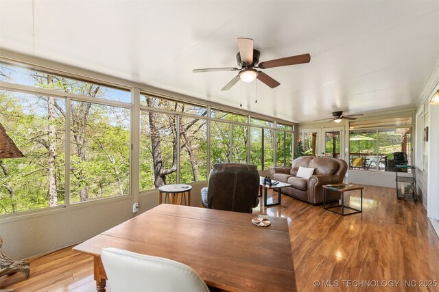 5068 County Road 370, Eucha, OK 74342 - sunroom / solarium with a ceiling fan, outdoor dining area, and a healthy amount of sunlight