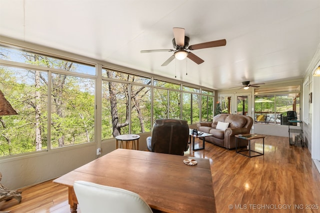 5068 County Road 370, Eucha, OK 74342 - sunroom / solarium featuring ceiling fan, outdoor dining space, and healthy amount of natural light