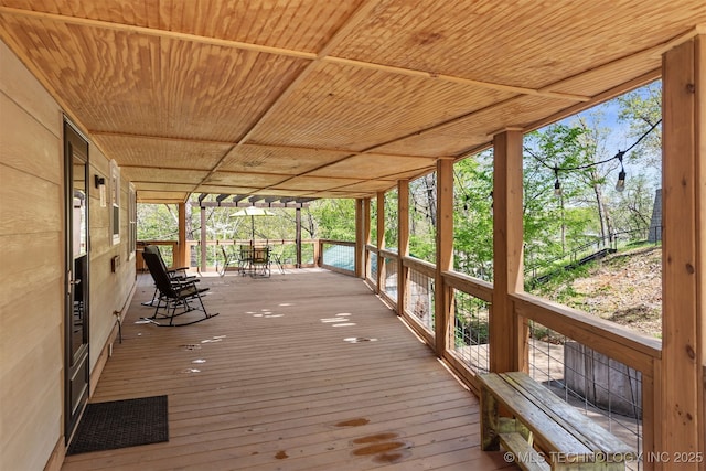 5068 County Road 370, Eucha, OK 74342 - wooden deck featuring outdoor dining area