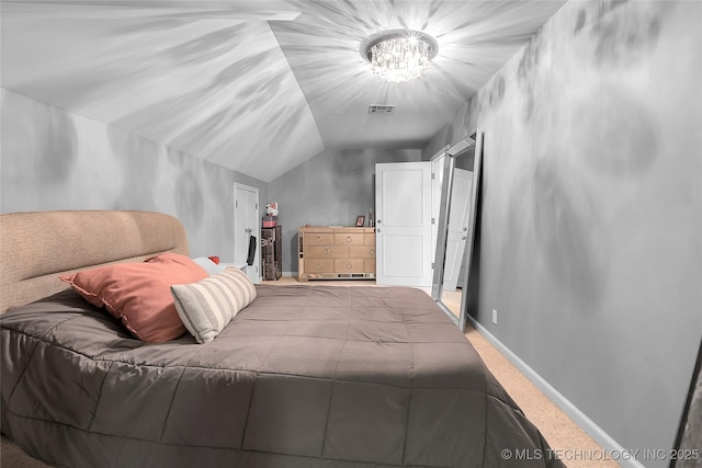 4829 S Zunis Ave, Tulsa, OK 74105 - bedroom with visible vents, an inviting chandelier, carpet floors, and lofted ceiling