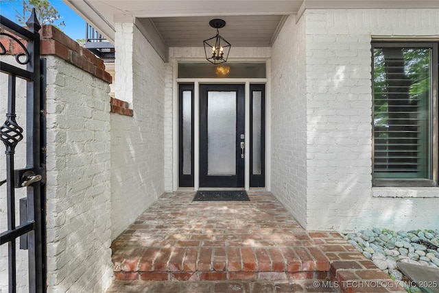 4829 S Zunis Ave, Tulsa, OK 74105 - entrance to property with a gate and brick siding