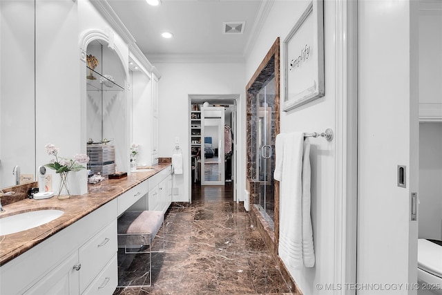 4829 S Zunis Ave, Tulsa, OK 74105 - bathroom with a sink, double vanity, visible vents, ornamental molding, and marble finish floor