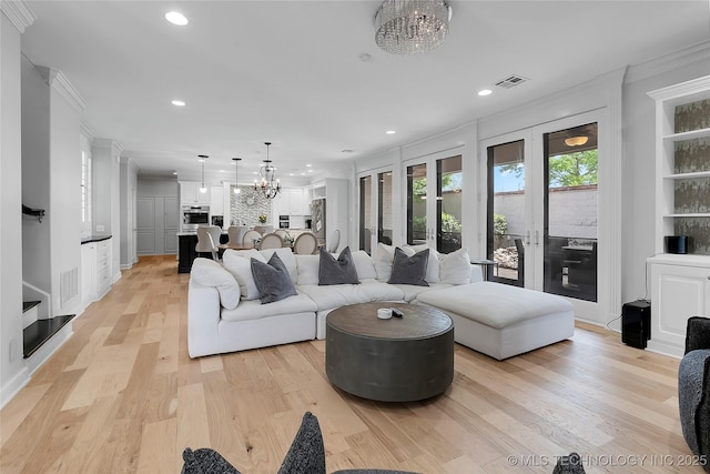 4829 S Zunis Ave, Tulsa, OK 74105 - living area featuring ornamental molding, visible vents, recessed lighting, and a notable chandelier