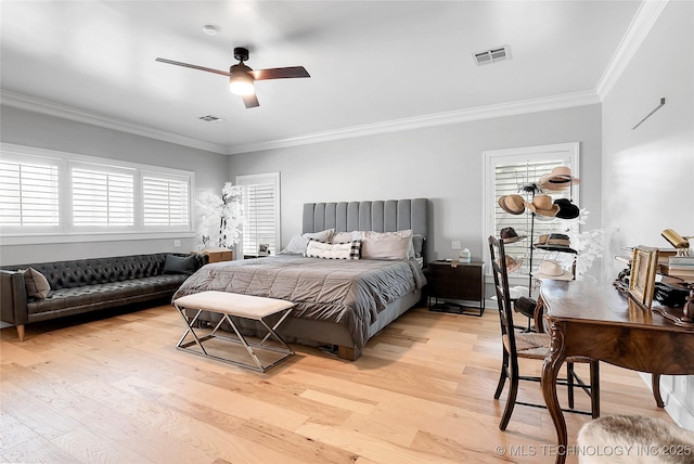 4829 S Zunis Ave, Tulsa, OK 74105 - bedroom with light wood-style flooring, visible vents, and ornamental molding