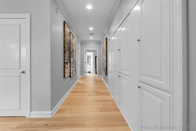 4829 S Zunis Ave, Tulsa, OK 74105 - hallway with light wood finished floors, recessed lighting, visible vents, baseboards, and ornamental molding