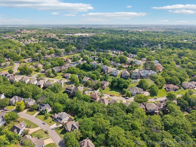 birds eye view of property with a residential view