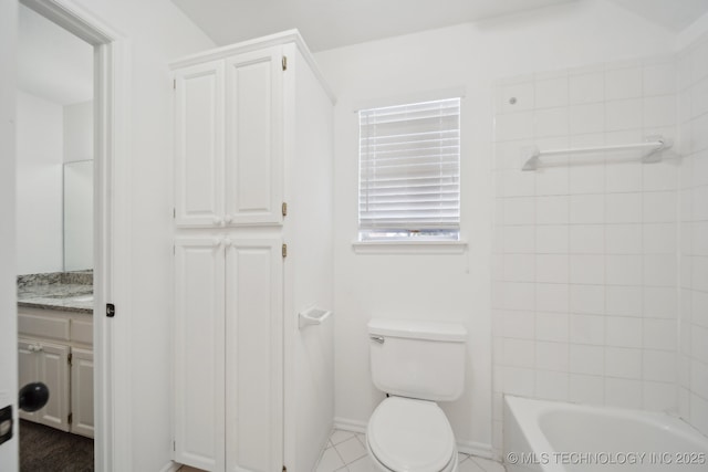 bathroom with toilet, baseboards, and vanity