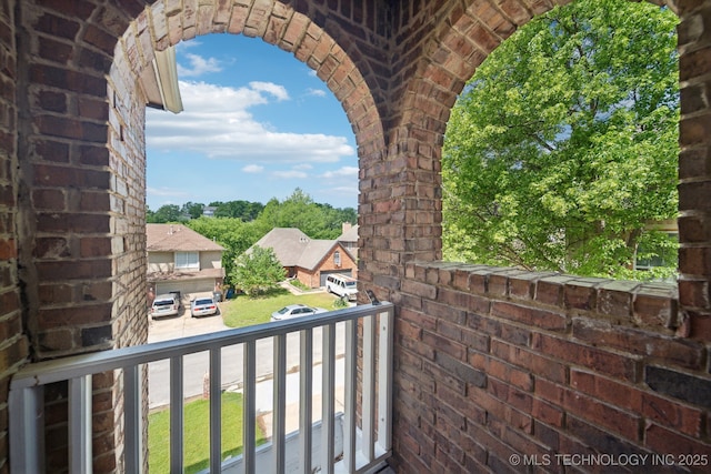 balcony featuring a residential view