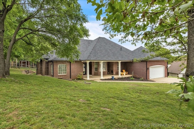 13215 E 182nd Cir, Bixby, OK 74008 - view of front facade with concrete driveway, an attached garage, brick siding, a front lawn, and roof with shingles