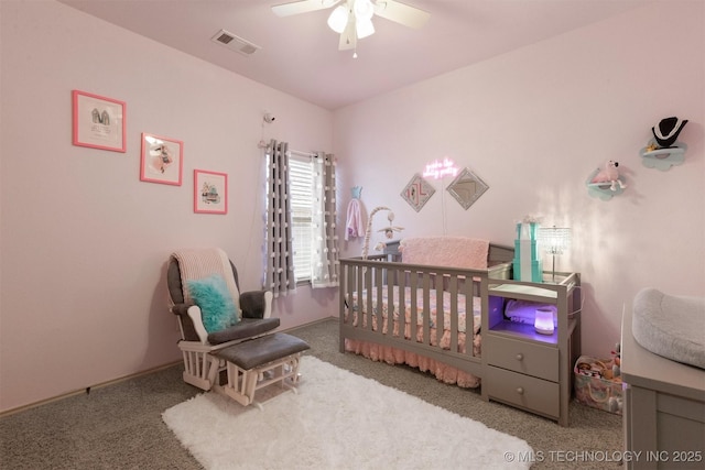 14530 S Gary Pl, Bixby, OK 74008 - bedroom featuring visible vents, a ceiling fan, carpet flooring, and a nursery area