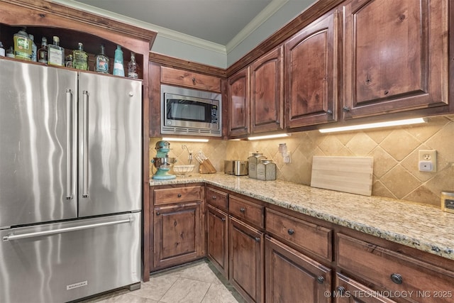14530 S Gary Pl, Bixby, OK 74008 - kitchen with crown molding, light stone countertops, stainless steel appliances, and tasteful backsplash
