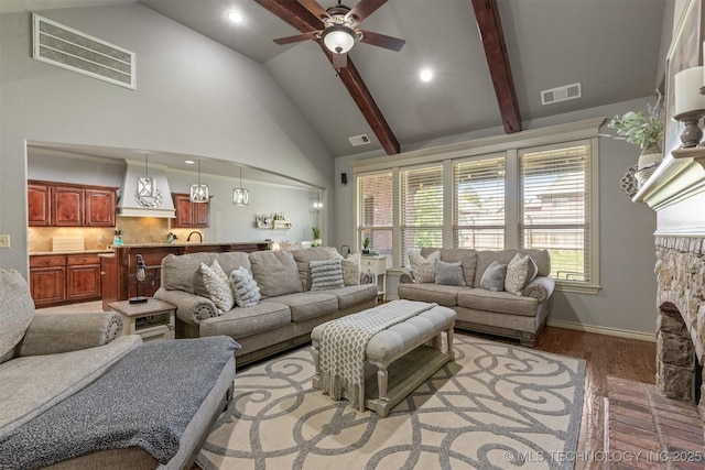 14530 S Gary Pl, Bixby, OK 74008 - living room featuring visible vents, ceiling fan, and light wood-style flooring
