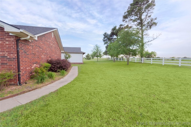 view of yard featuring fence