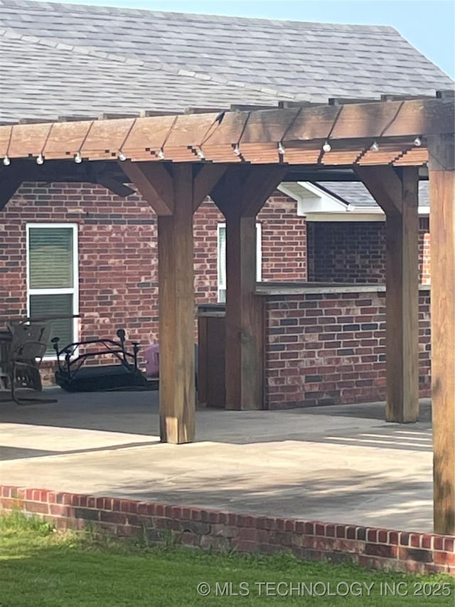 view of patio / terrace featuring a pergola