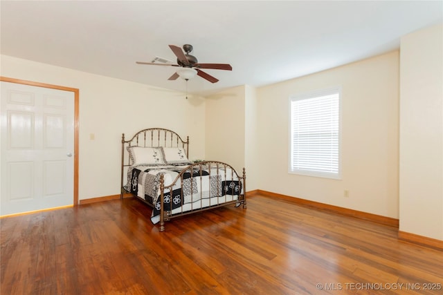 2284 E Roping Rd, Atoka, OK 74525 - bedroom featuring wood finished floors and baseboards