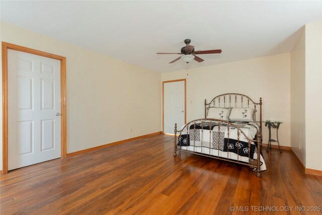 2284 E Roping Rd, Atoka, OK 74525 - bedroom featuring wood finished floors and ceiling fan