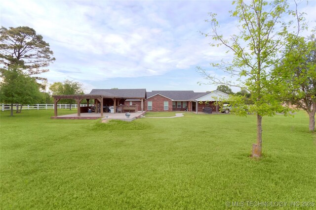 2284 E Roping Rd, Atoka, OK 74525 - rear view of house with a patio area