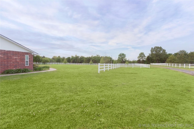 view of yard with fence