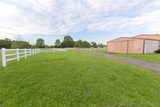 2284 E Roping Rd, Atoka, OK 74525 - view of yard featuring an outbuilding