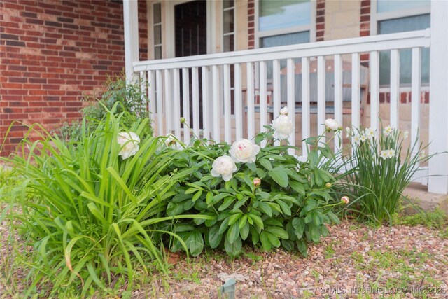 2284 E Roping Rd, Atoka, OK 74525 - exterior view of brick siding