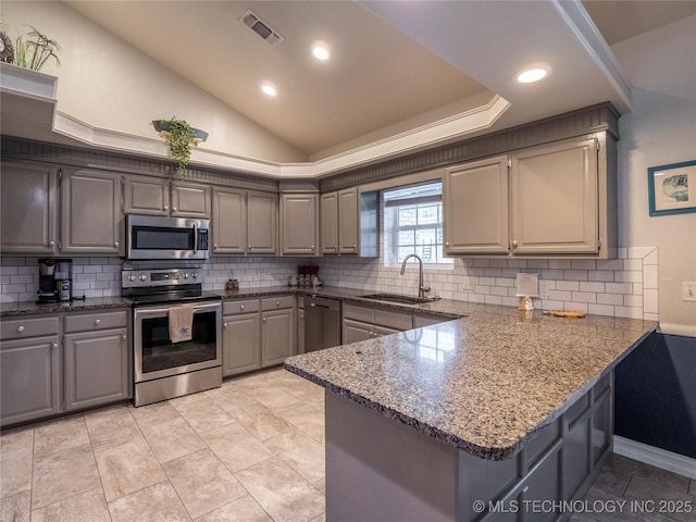 1904 Sandpiper St, Mcalester, OK 74501 - kitchen featuring a sink, visible vents, stainless steel appliances, a peninsula, and gray cabinets