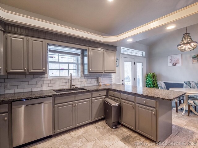 1904 Sandpiper St, Mcalester, OK 74501 - kitchen featuring stainless steel dishwasher, a sink, gray cabinetry, a peninsula, and backsplash