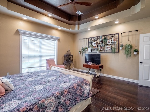 1904 Sandpiper St, Mcalester, OK 74501 - bedroom featuring recessed lighting, hardwood / wood-style flooring, baseboards, visible vents, and a tray ceiling