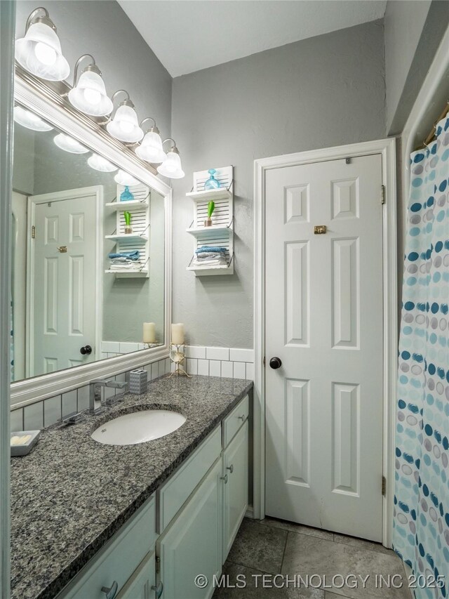 1904 Sandpiper St, Mcalester, OK 74501 - bathroom with tile patterned floors and vanity