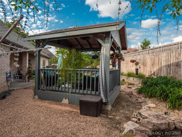 1904 Sandpiper St, Mcalester, OK 74501 - view of patio / terrace with fence, a gazebo, and a wooden deck