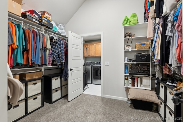 9218 N 141st E Ave, Owasso, OK 74055 - spacious closet with lofted ceiling, washing machine and clothes dryer, and carpet floors