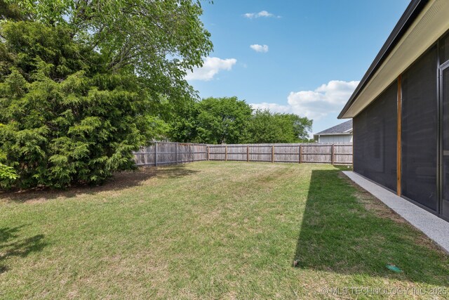 9218 N 141st E Ave, Owasso, OK 74055 - view of yard with a fenced backyard
