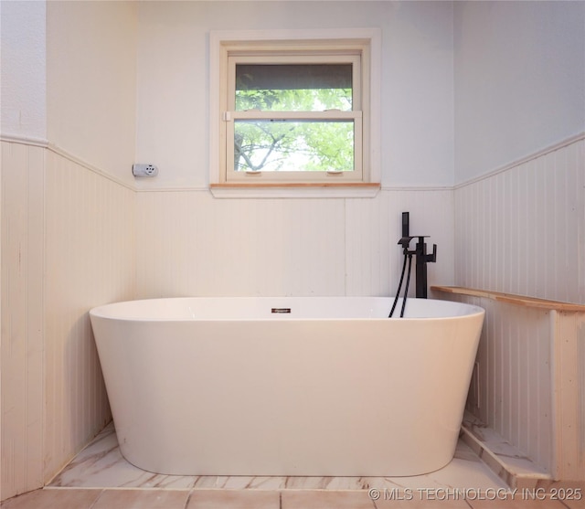 9585 Celia Berryhill Rd, Okmulgee, OK 74447 - full bath with wainscoting and a soaking tub
