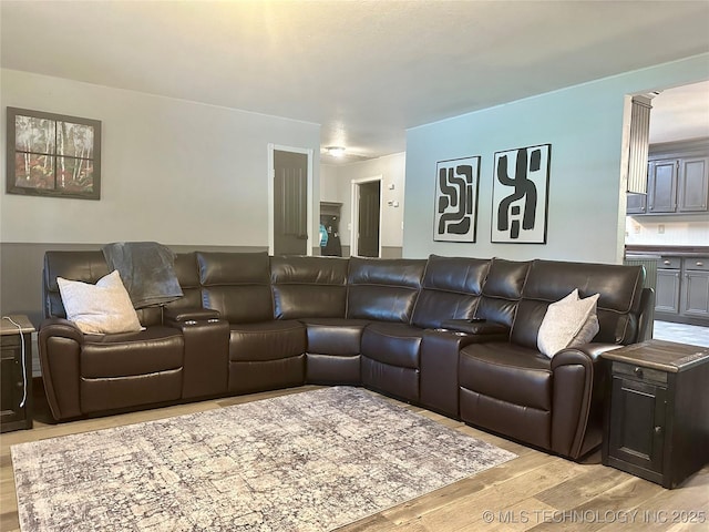 9585 Celia Berryhill Rd, Okmulgee, OK 74447 - living room featuring light wood finished floors