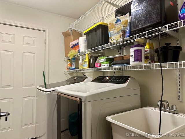 9585 Celia Berryhill Rd, Okmulgee, OK 74447 - laundry area featuring independent washer and dryer and crown molding