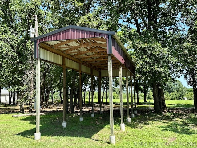 9585 Celia Berryhill Rd, Okmulgee, OK 74447 - view of home's community featuring a lawn and view of wooded area