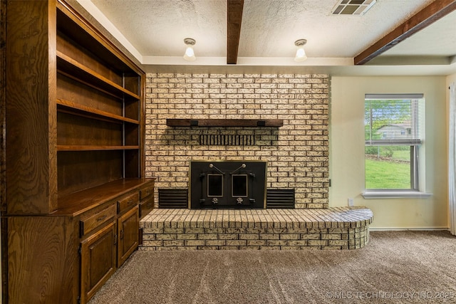 unfurnished living room featuring beamed ceiling, a fireplace, visible vents, carpet, and a textured ceiling