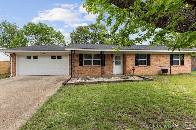 ranch-style home featuring a front yard, driveway, an attached garage, and brick siding