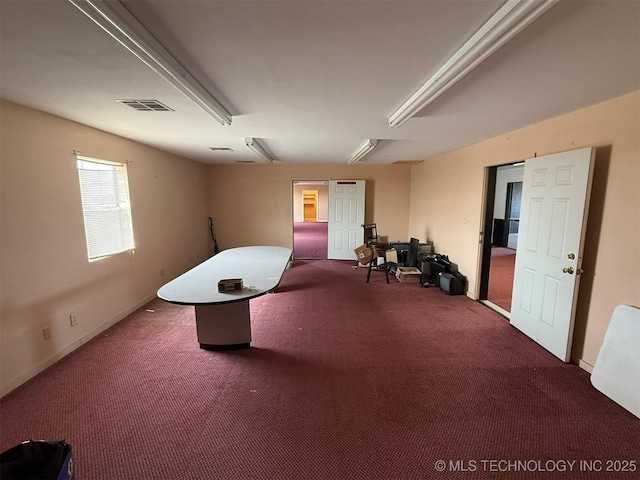 sitting room with carpet and visible vents